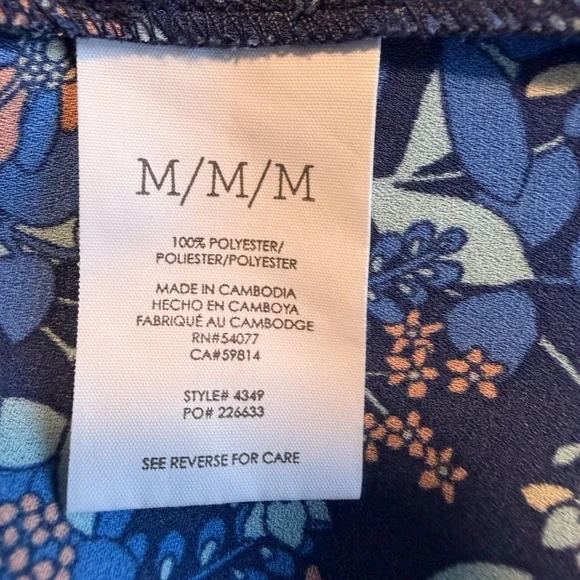 Cabi Blue Floral Sleeveless Top. Button front with small ruffle collar & edge. - Picture 7 of 9